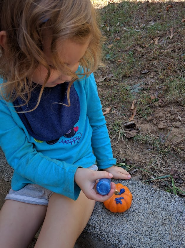 Pumpkin craft with glitter glue
